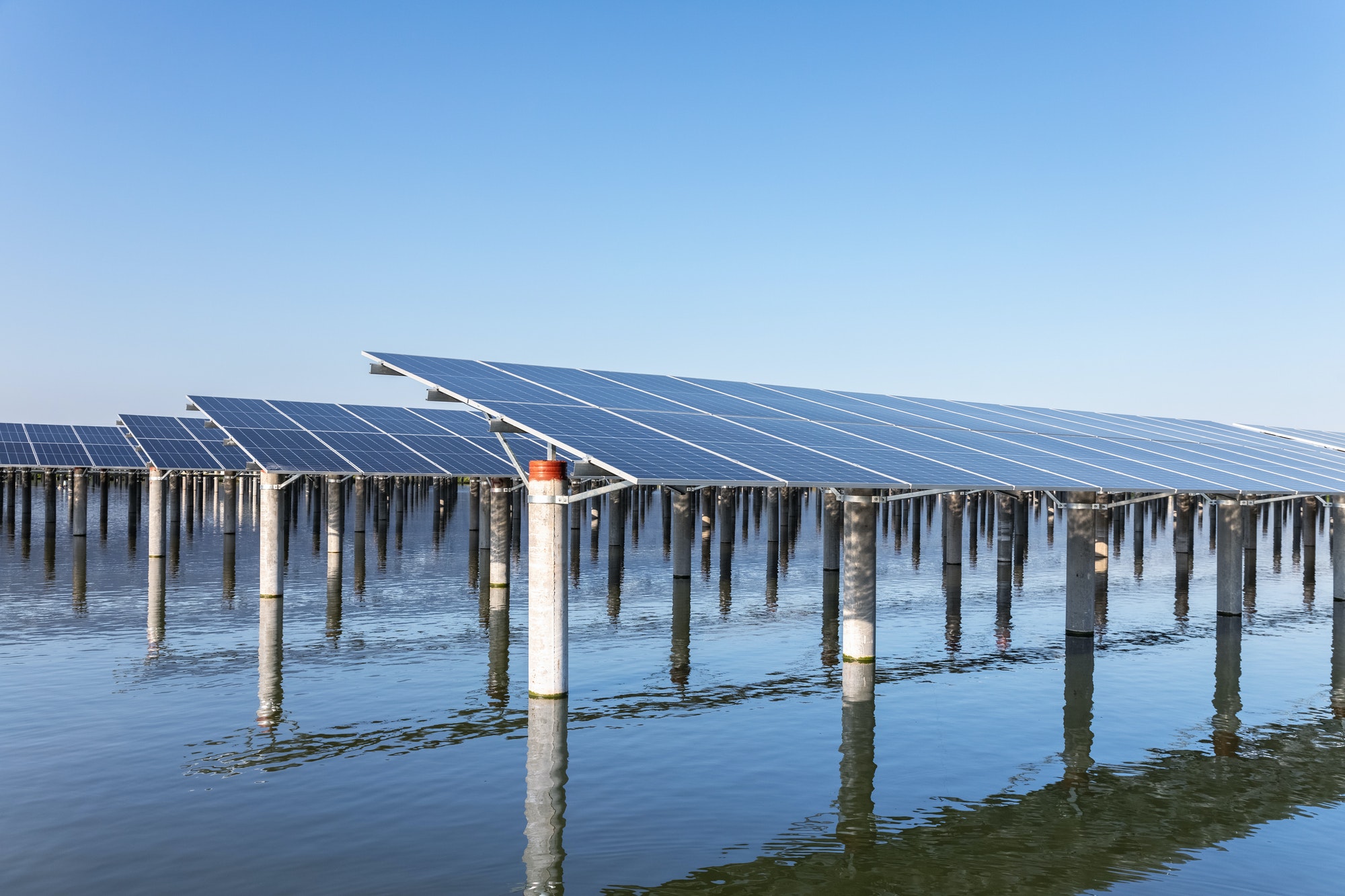 rows-of-solar-panels-on-the-water.jpg
